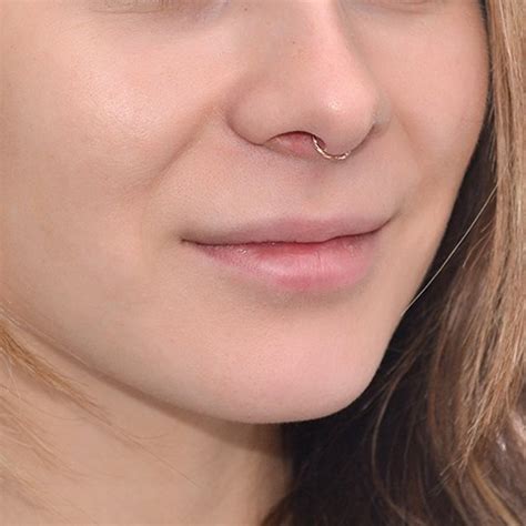 Metal This 16G septum clicker ring is made of ASTM F136 implant-grade titanium the kind used. . 16g septum ring